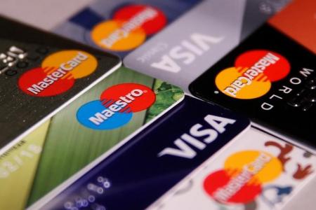 MasterCard, VISA and Maestro credit cards are seen in this picture illustration taken June 9, 2016. REUTERS/Maxim Zmeyev/Illustration